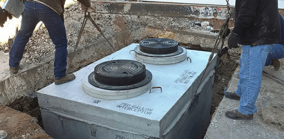 Grease trap installation for a commercial property drainage system in Saint Louis, MO
